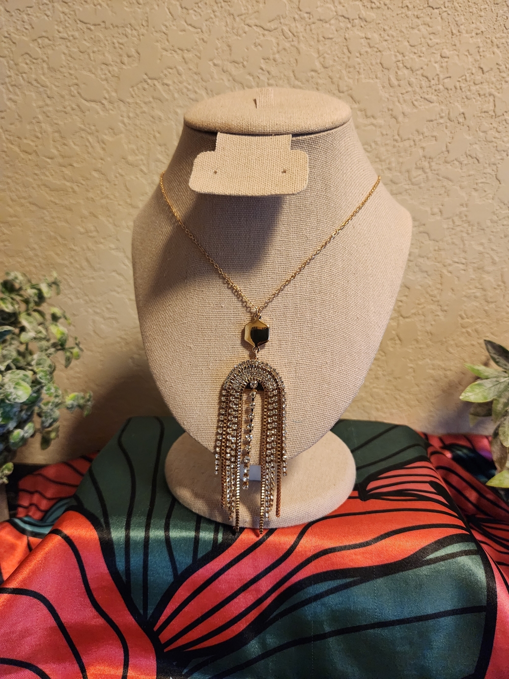 Gold Tone Tassel Pendant Necklace with Crystal Accents